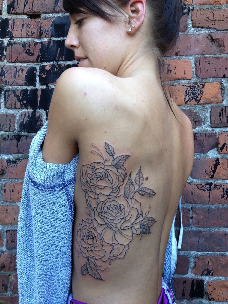 girl flower tattoos on side