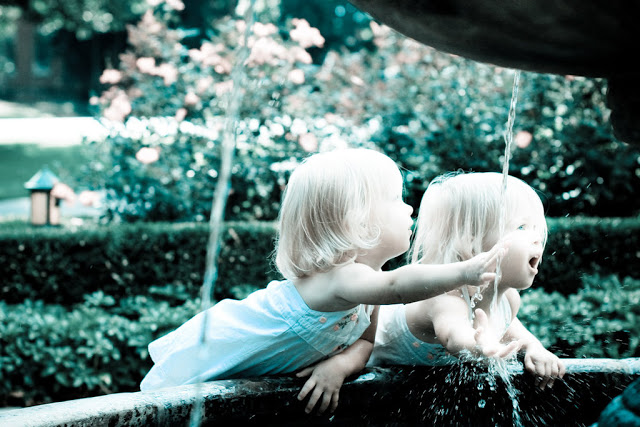 Baby Twins Play With Water