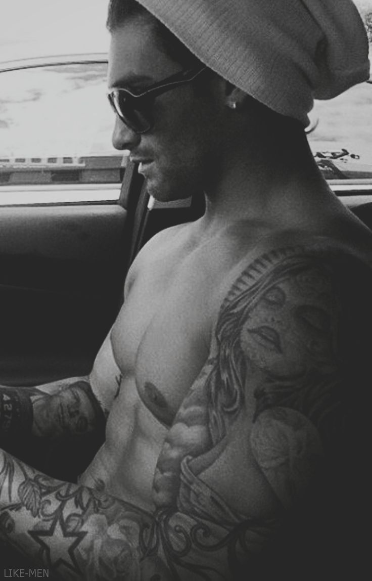 Shirtless with muscles tattoos